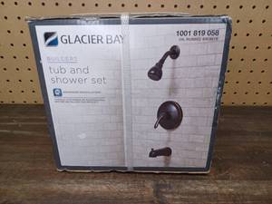 lot 23 image: New Glacier Bay Builders Single-Handle 1-Spray Tub and Shower Faucet in Bronze (Valve Included)