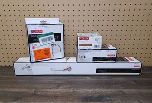 lot 24 image: Delta Crestfield 4-Piece Bath Hardware Set in Brushed Nickel, Includes a 24 in. Towel Bar, Towel Ring, Toilet Paper Holder, and a Multi-Purpose Hook
