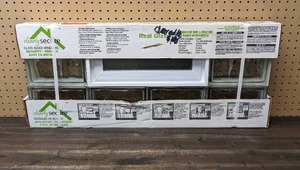 lot 144 image: New Clearly Secure 31 in. x 13.5 in. x 3.125 in. Frameless Wave Pattern Vented Glass Block Window