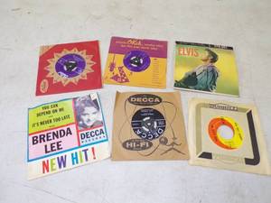 lot 11 image: Very Cool Collection of Vintage 45s Elvis, Beach Boys and others in Original Sleeves