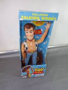 lot 12 image: Collectable Toy Story Talking Woody Pull String Doll in Box