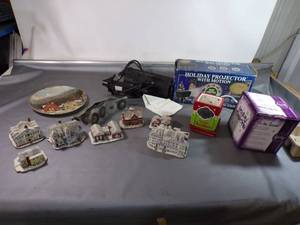 lot 58 image: Norman Rockwell Main street Figures Working Holiday Projector Sentsy Pot and More