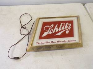 lot 72 image: Vintage 1950s Schlitz Beer Sign  Metal Glass Front Needs a New Bulb