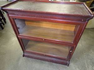 lot 82 image: Vintage Lawyers Cabinet on Wheels With Glass Doors