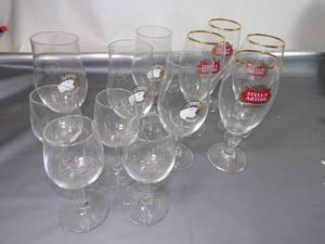 lot 107 image: Lot of 12 Beer Cordial Glasses Stella Artous Cidre, Stella Artous Belgium , and Goose Island Perfect for the Man Cave, She Shed, or Bar