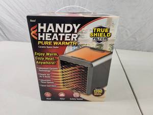 lot 52 image: New Handy Heater Portable Space Heater