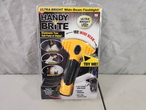lot 69 image: New Handy Brite Wide-Beam Flashlight