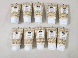 lot 116 image: 10 New Travel Sized Tubes of Origins Hand Lotion