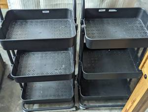 lot 22 image: 2 Metal Carts on caster wheels...
