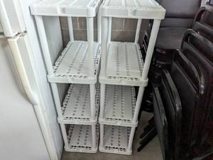 lot 25 image: 2 Plastic shelves standing 4 feet t...