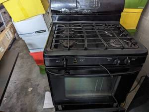 lot 26 image: Frigidaire Gas stove and oven, some...