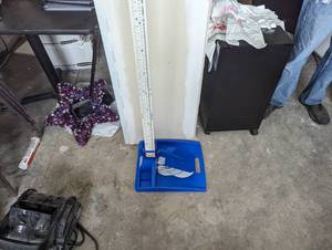 lot 32 image: 82 height measuring stick with cra...