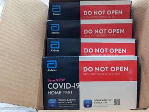 lot 38 image: Binax Now Covi 19 tests 4 pack...