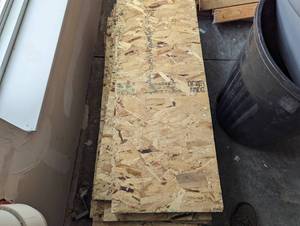 lot 48 image: Stack of 26 48x18 particle board...