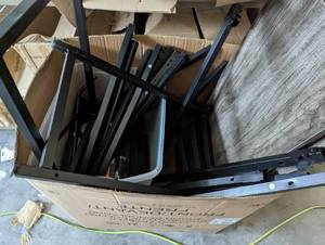 lot 60 image: Table with metal frame, appears com...
