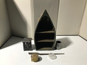 lot 19 image: Canoe shelf, cast iron candle holder ( very heavy) and 2 small jewelry boxes