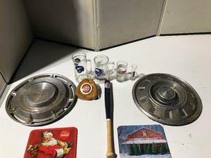lot 11 image: Viking mugs, hub caps, coke trays, twins bat, cubs night light and more
