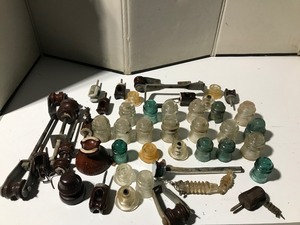 lot 10 image: Vintage insulators & glass boat light