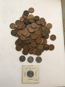 lot 38 image: 127 wheat Pennies, 4 steel war pennies and 2 books with some wheat Pennies in them