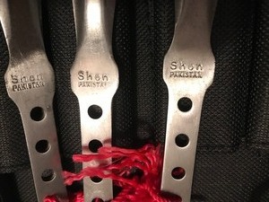 lot 91 image: 12 stainless steel throwing knives with case