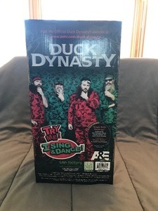 lot 146 image: DUCK DYNASTY Commander Rockin Uncle Si Santa Sings Dances Christmas Figurine in box