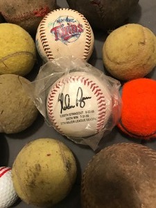 lot 360 image: Lot of balls and baseball glove