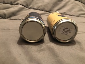 lot 362 image: 2 die cast cars inside of Coors and Pepsi can