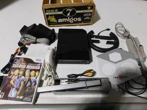 lot 229 image: Wii with  games