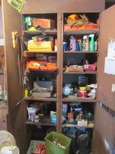lot 23 image: All content inside tall garage stor...