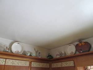 lot 37 image: All decor on upper Ledge in kitchen...