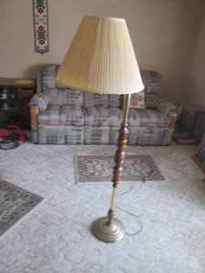 lot 66 image: Wood and Brass tone floor lamp with...
