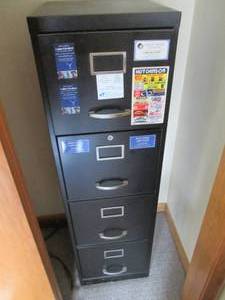 lot 76 image: Content of office closet including ...