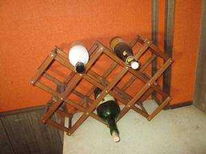 lot 145 image: Collapsible wood wine rack with emp...