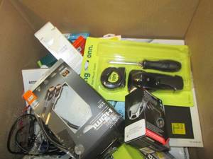 box of phone and tv items ...