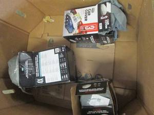 pallet with car covers and wheel co...