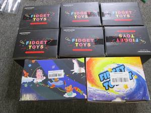 8 boxes of fidget toys ...