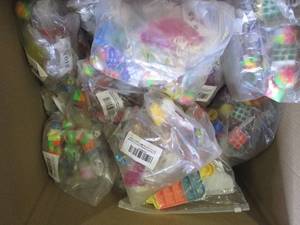 box of bagged fidget toys ...