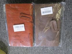 2 journals look like leather ...