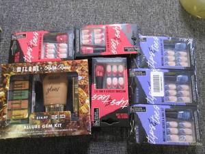 lot of fake nails and nail polish ...