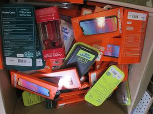 box of screen protectors and cases ...