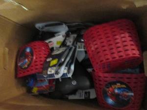box of bike seats , baskets and han...