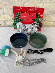 lot 37 image: Lot of Dog Bowls, Toys, and Medium Sized Collars and Sweater