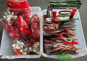 lot 79 image: Lot of over 100 Christmas Gift Bags and Bows