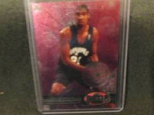 104.      1997-98 Fleer Metal Tim D...