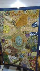 lot 9 image: Wall Art from Old Festival Garments
