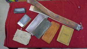 lot 47 image: Lot of Misc Folders Books and Sharping Strap