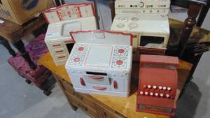 lot 68 image: 4-Vintage Metal Toy Stoves and Cash Register