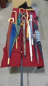 lot 111 image: Various Canes and Umbrellas