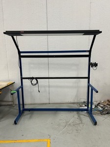 lot 68 image: PRODUCTION BASICS Workbench Frame with Lights and Power Strip