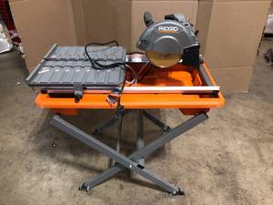 RIDGID 9 Amp Corded 7 in. Wet Tile Saw with Stand, Customer return, Review all pictures